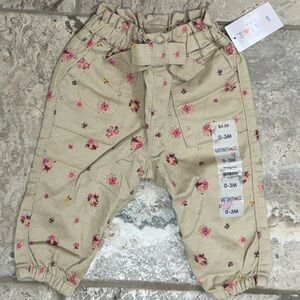 NWT size 0-3 months
Stylish Beige Kids Bottoms with Pink Floral Print